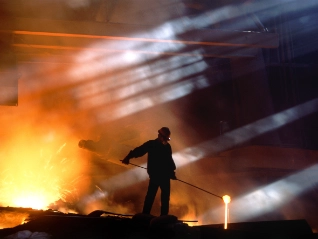 smelting worker moving ore
