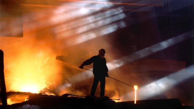smelting worker moving ore