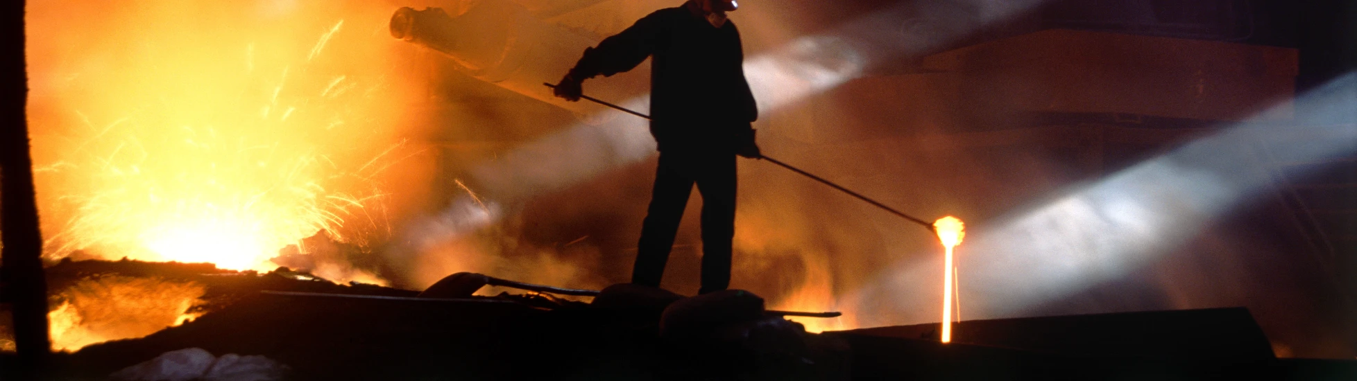 smelting worker moving ore