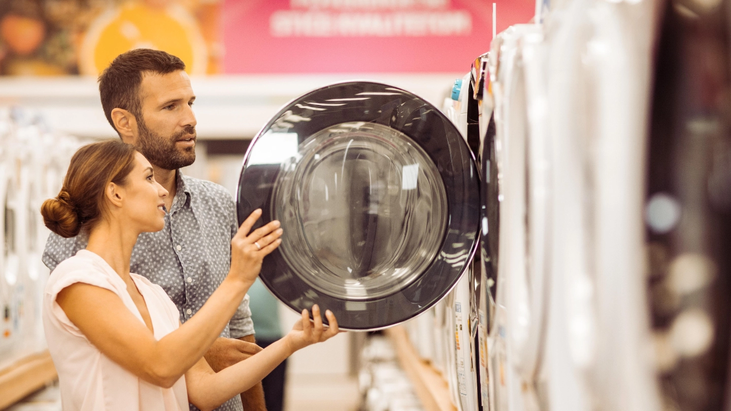 couple buying washing machines couple buying washing machines