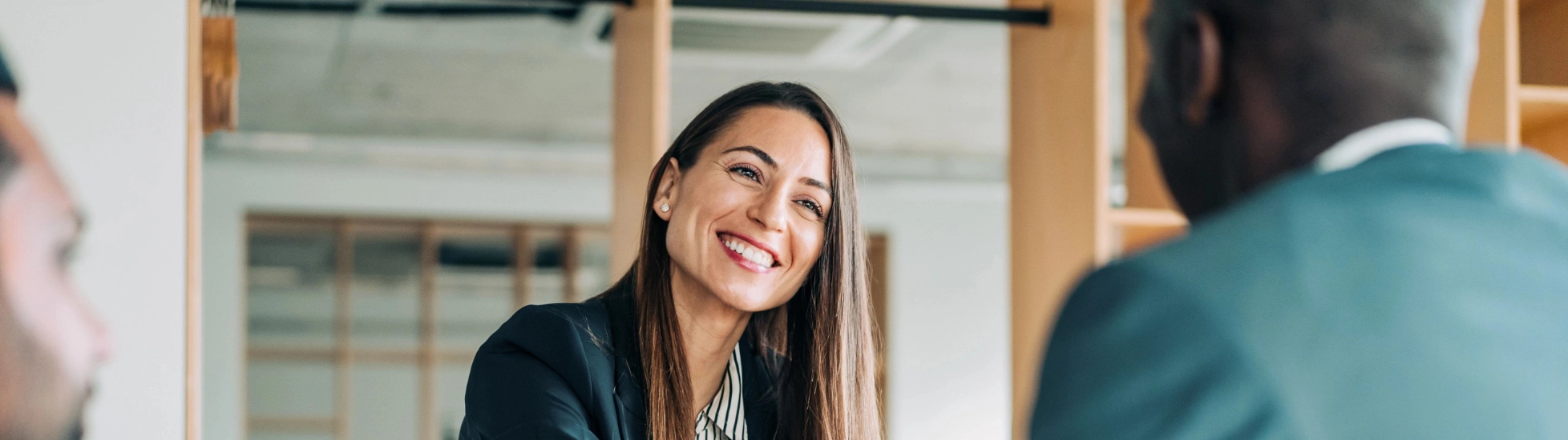 woman shakes hand of man