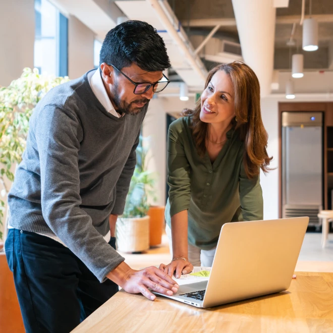Man and woman with laptop